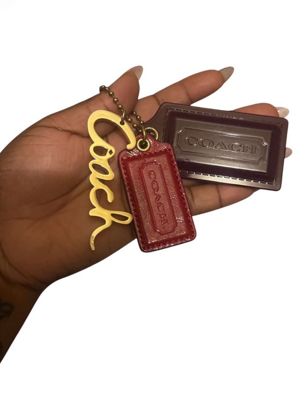 Coach Red and Burgundy Leather Keychain with Gold Script Charm